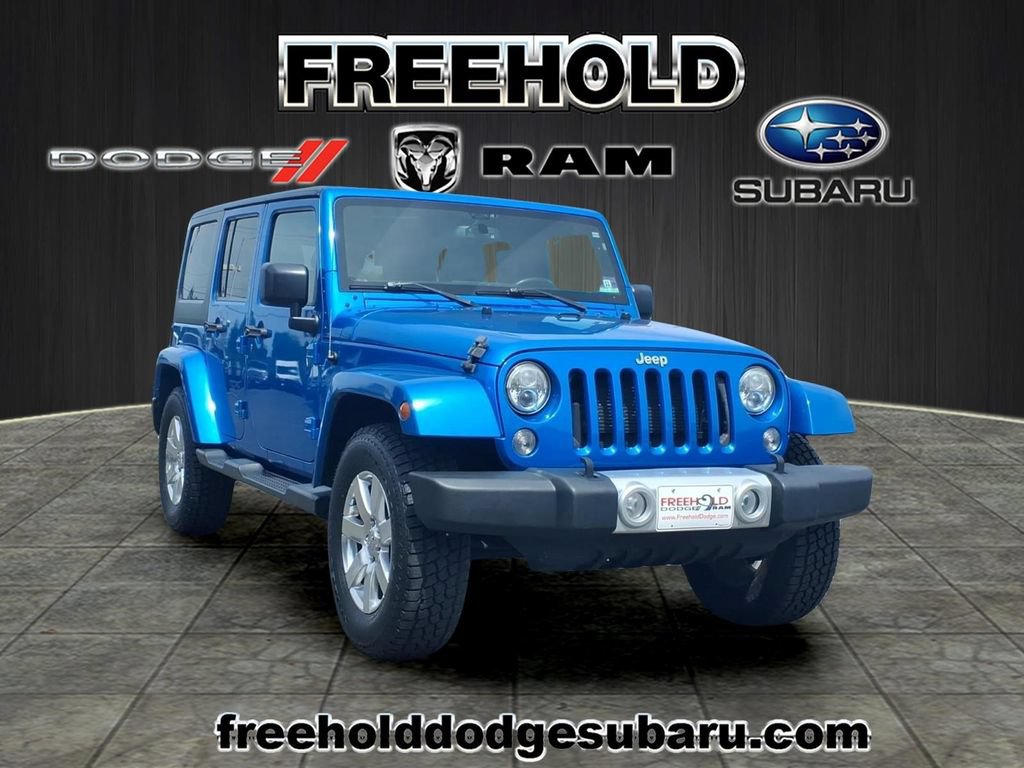 Used 2015 Jeep Wrangler Unlimited Sahara w/ Dual Top Group AWD/4WD video 1
