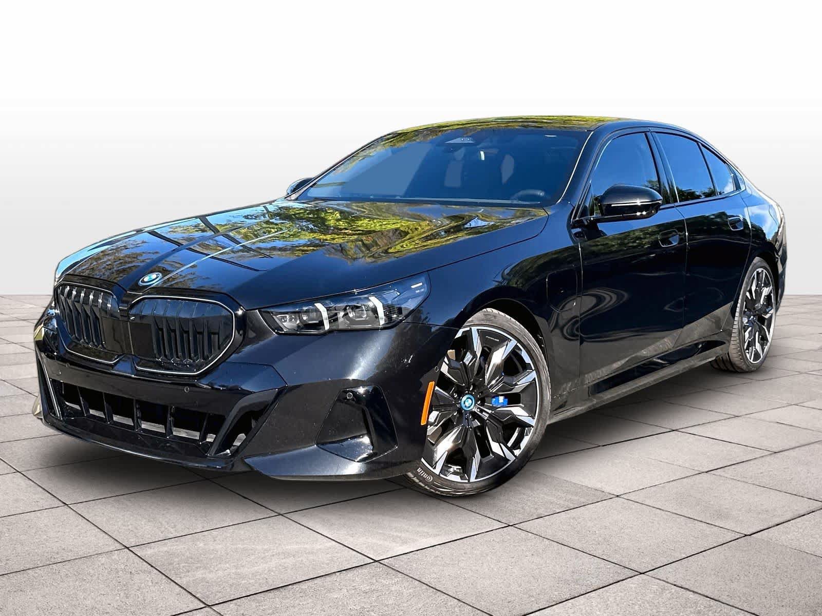 Used 2025 BMW 550e xDrive w/ Premium Package