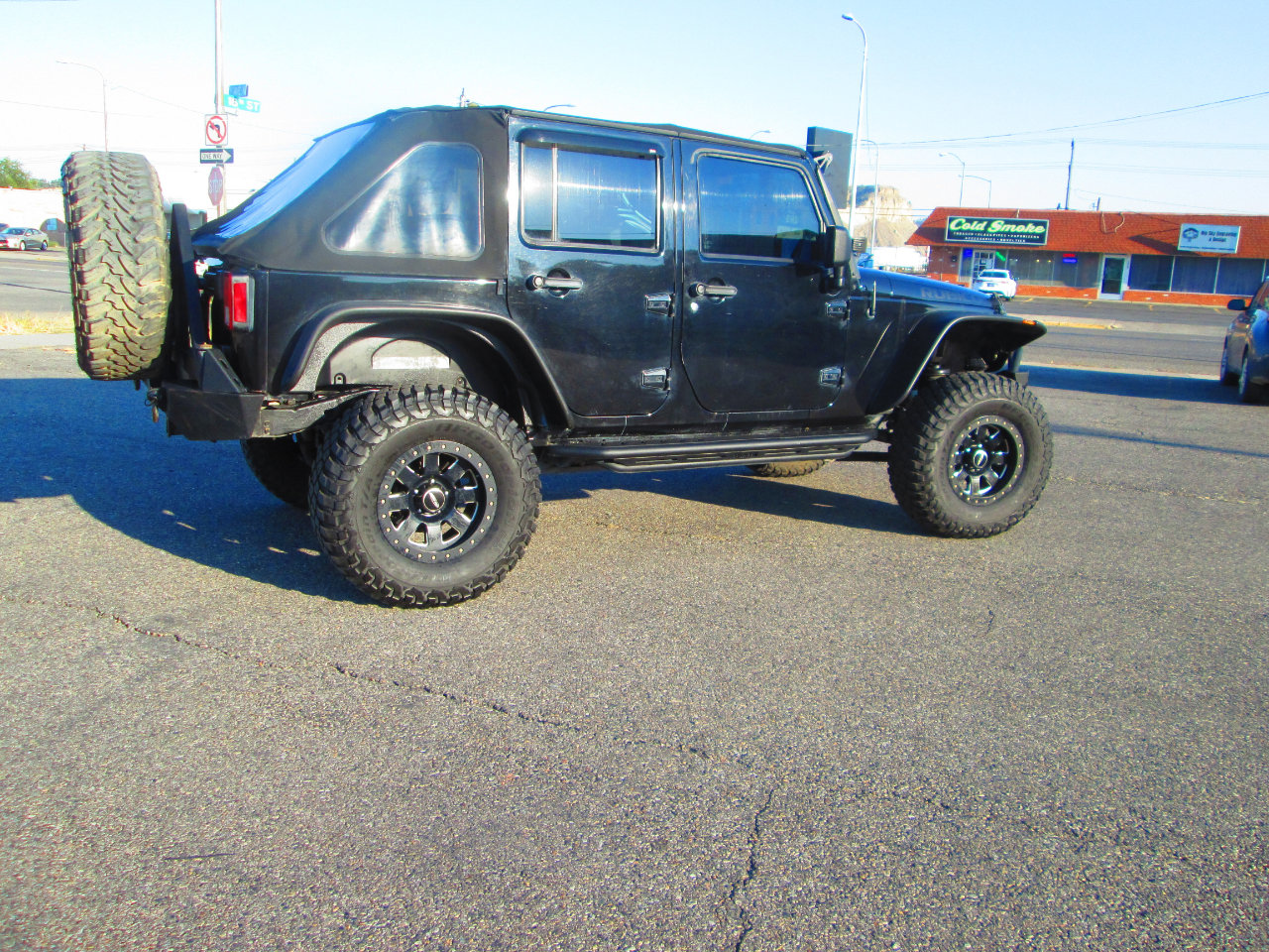 Used 2012 Jeep Wrangler Unlimited Rubicon w/ Dual Top Group image 2