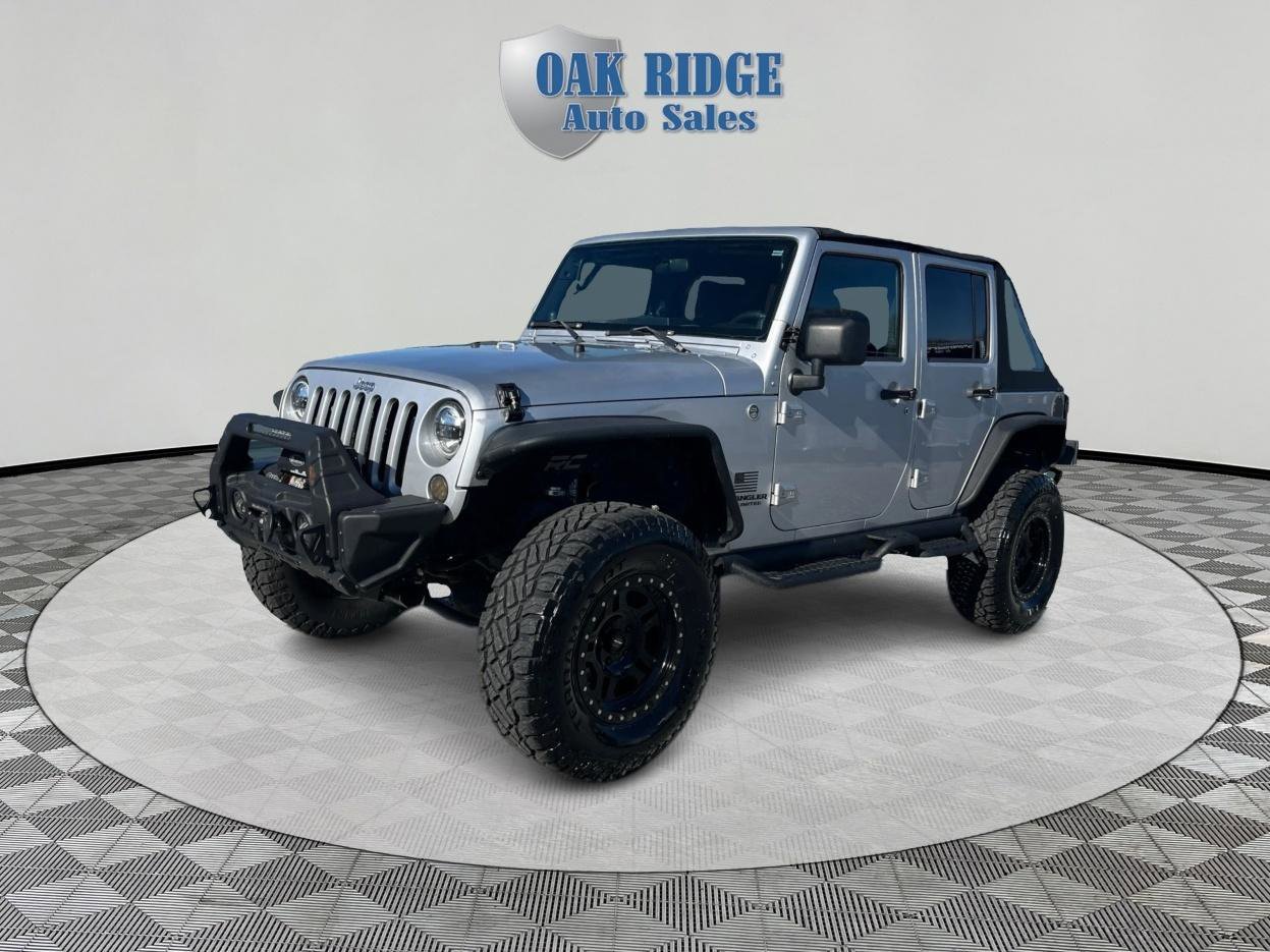 Used 2009 Jeep Wrangler Unlimited Rubicon w/ Dual Top Group image 1