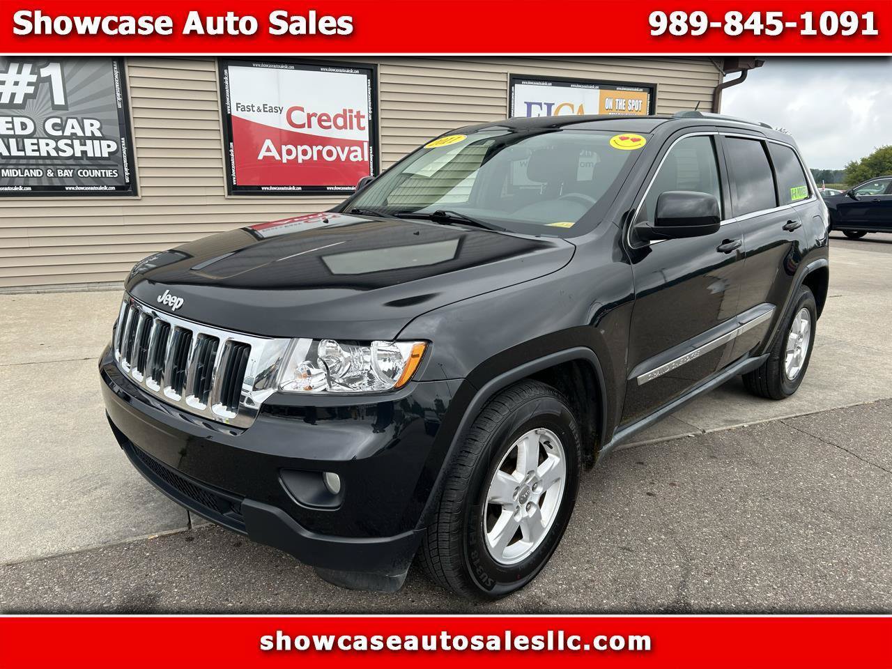 Used 2011 Jeep Grand Cherokee Laredo AWD/4WD image 1