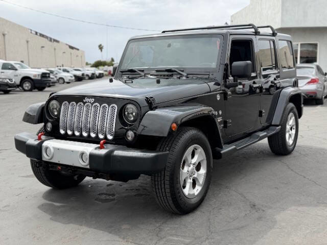Used 2014 Jeep Wrangler Unlimited Sahara w/ Dual Top Group AWD/4WD image 7
