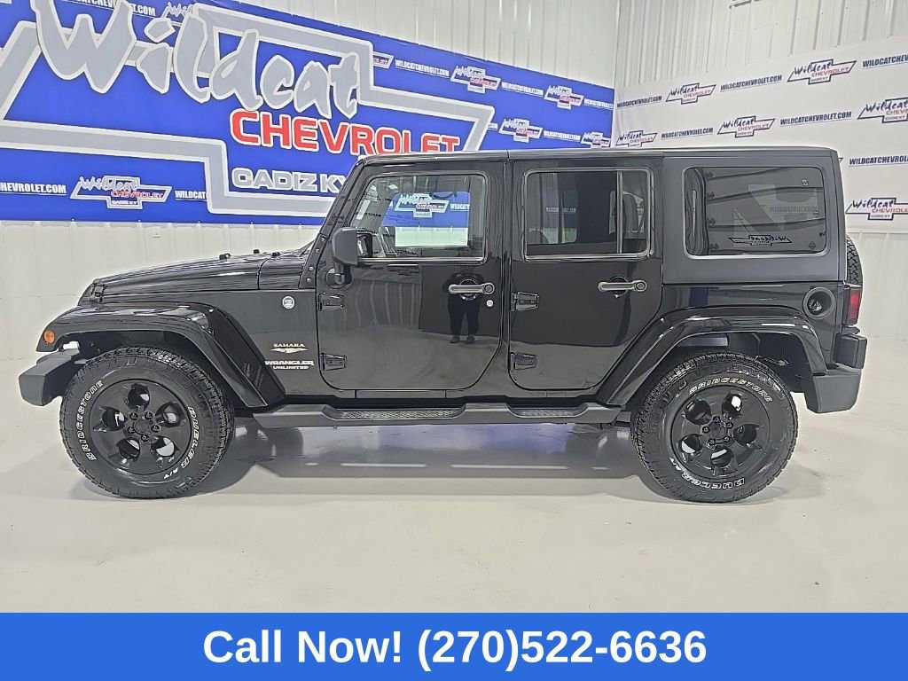 Used 2012 Jeep Wrangler Unlimited Sahara w/ Dual Top Group AWD/4WD image 5