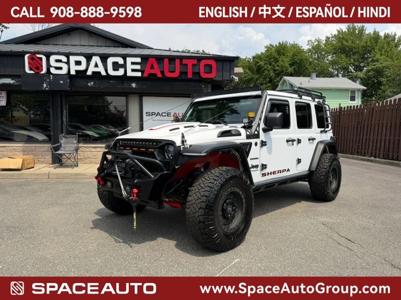 Used 2018 Jeep Wrangler Unlimited Sahara w/ Uconnect 4C Nav & Sound Group AWD/4WD image 1