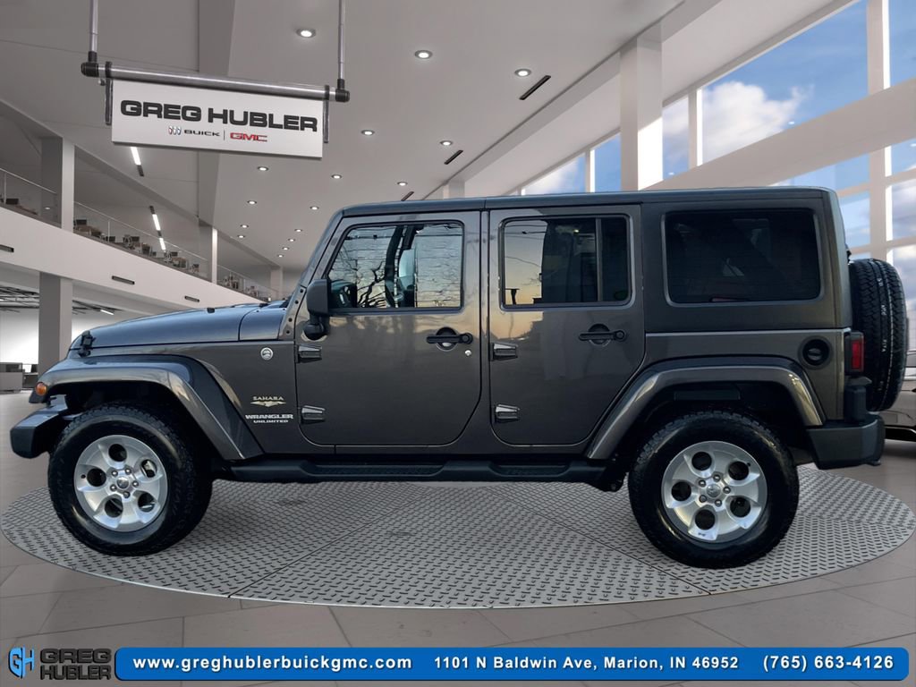 Used 2014 Jeep Wrangler Unlimited Sahara w/ Dual Top Group image 8