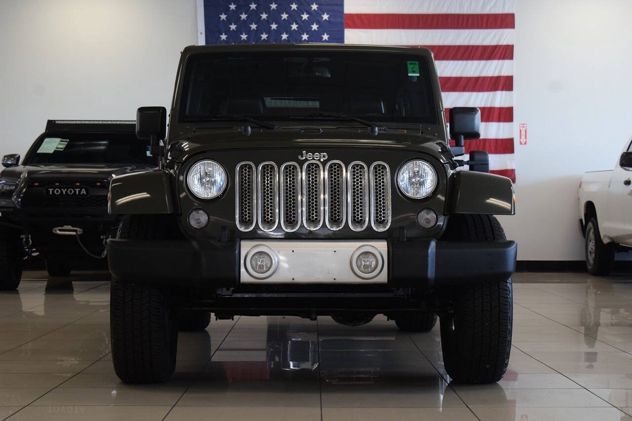 Used 2015 Jeep Wrangler Unlimited Sahara w/ Dual Top Group AWD/4WD image 2