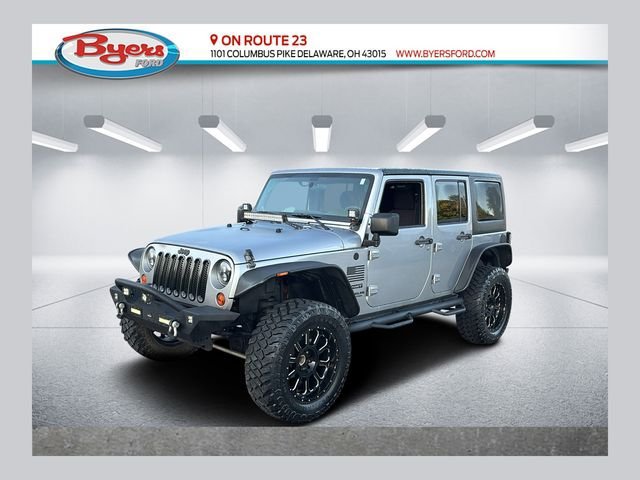 Used 2013 Jeep Wrangler Unlimited Sport w/ Mopar Black Appearance Group