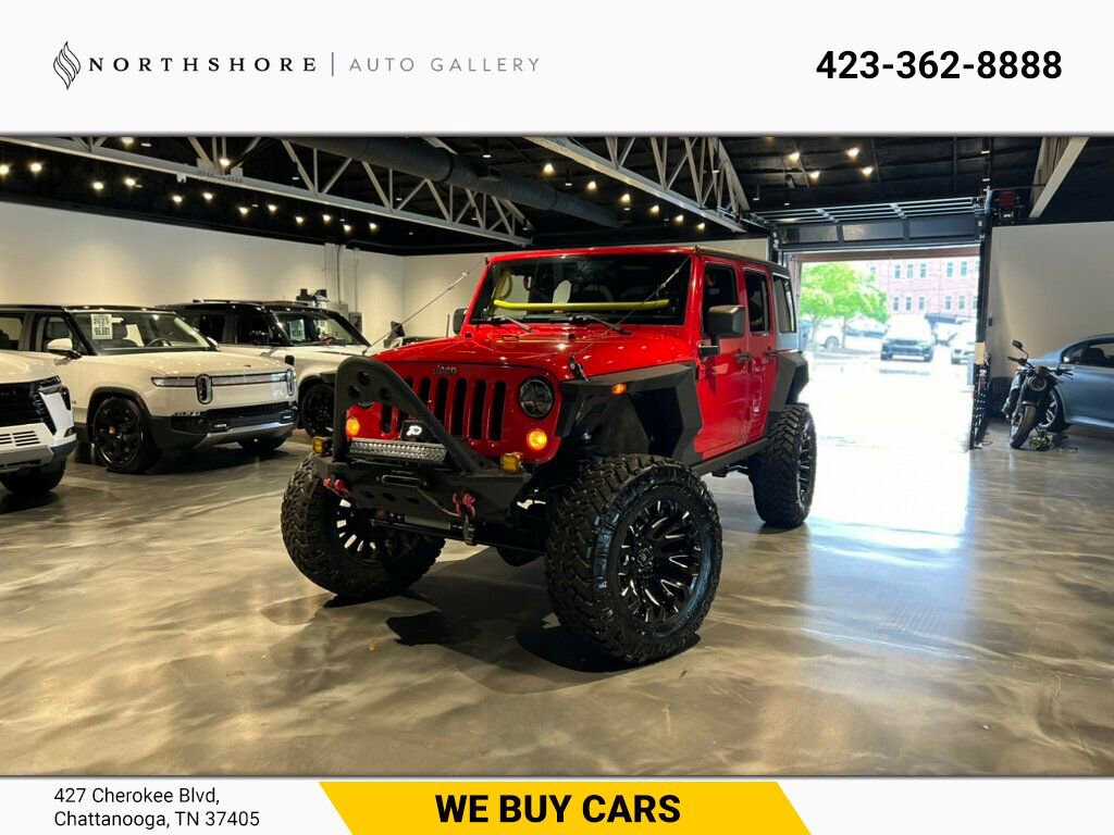 Used 2014 Jeep Wrangler Unlimited Rubicon w/ Max Tow Package video 1