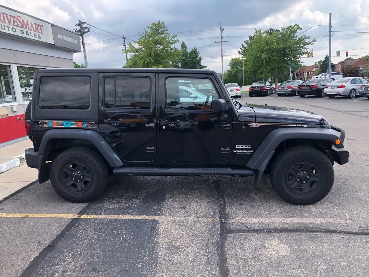 Used 2015 Jeep Wrangler Unlimited Sport w/ Mopar Black Appearance Group image 11