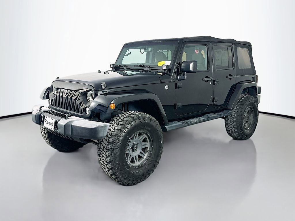 Used 2016 Jeep Wrangler Unlimited Sahara AWD/4WD video 3