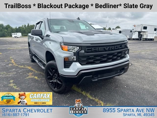 Certified 2024 Chevrolet Silverado 1500 Custom Trail Boss w/ Turbomax Blackout Package AWD/4WD image 1