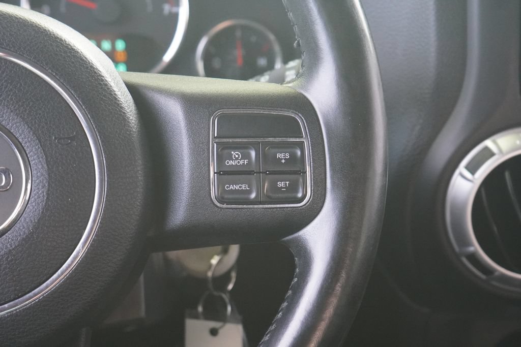 Used 2012 Jeep Wrangler Unlimited Sahara w/ Dual Top Group AWD/4WD image 16