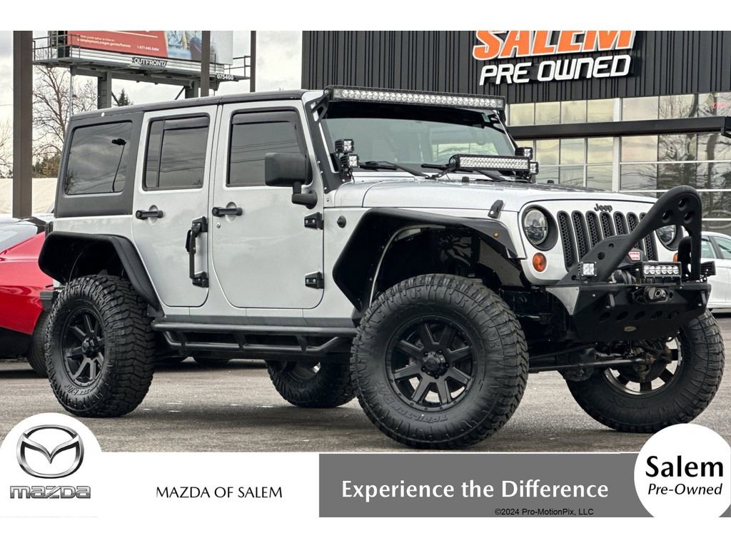 Used 2011 Jeep Wrangler Unlimited Sport