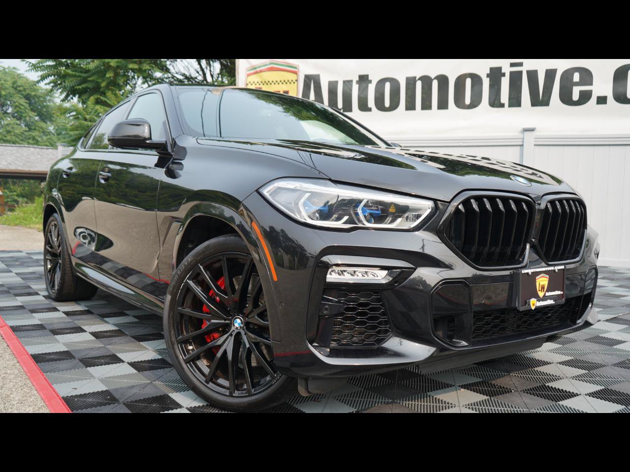 Used 2021 BMW X6 M50i w/ Executive Package AWD/4WD image 1