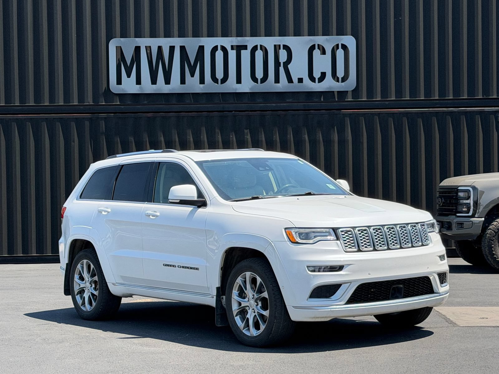 Used 2021 Jeep Grand Cherokee Summit AWD/4WD image 1