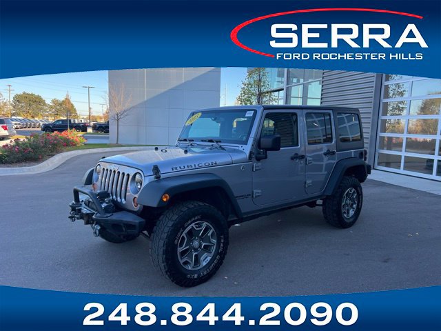 Used 2013 Jeep Wrangler Unlimited Rubicon w/ Dual Top Group AWD/4WD image 1