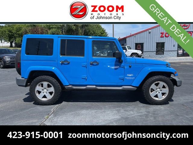 Used 2011 Jeep Wrangler Unlimited Sahara w/ Dual Top Group AWD/4WD image 1