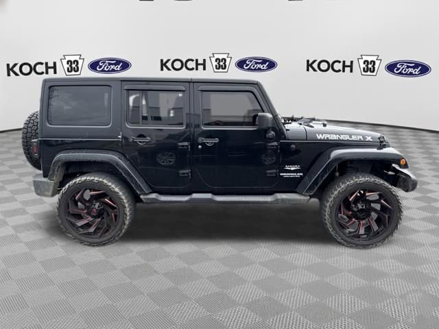 Used 2011 Jeep Wrangler Unlimited Sahara w/ Dual Top Group AWD/4WD image 9