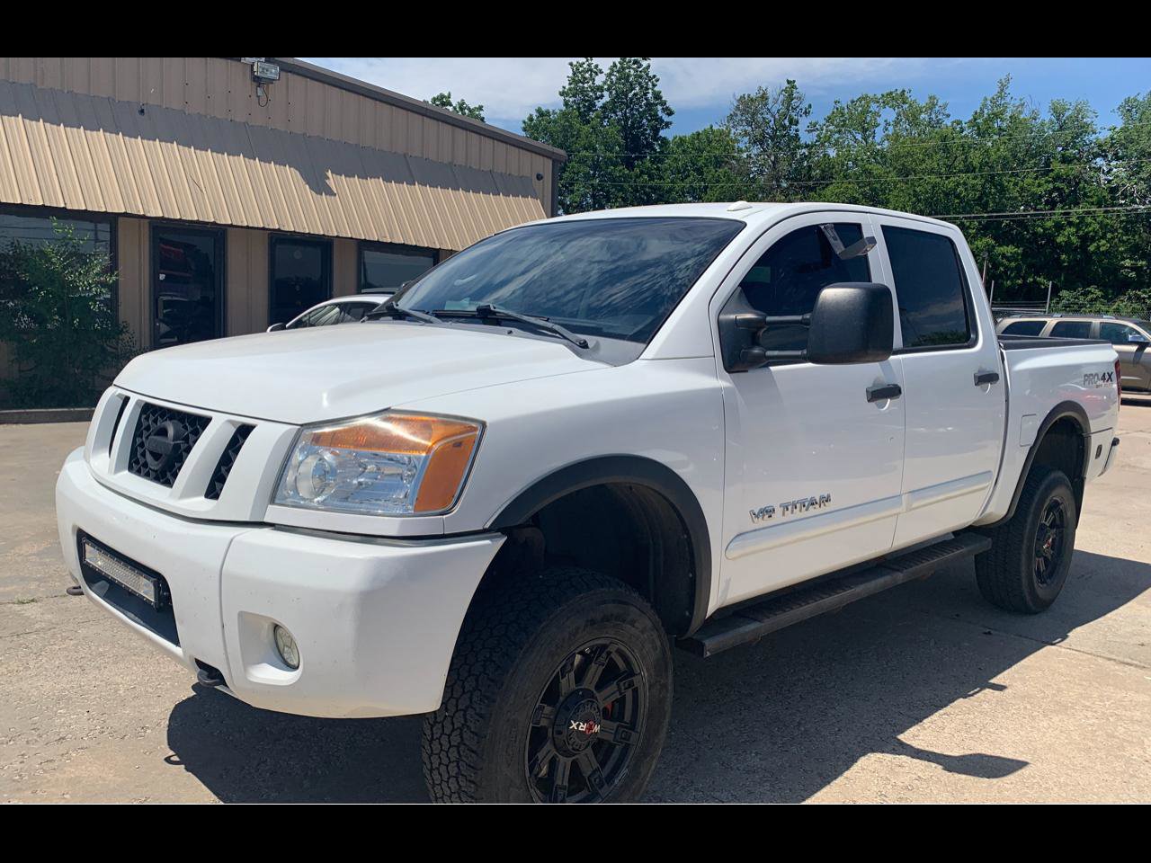 Used 2011 Nissan Titan PRO-4X w/ Pro-4x Premium Utility Pkg image 1