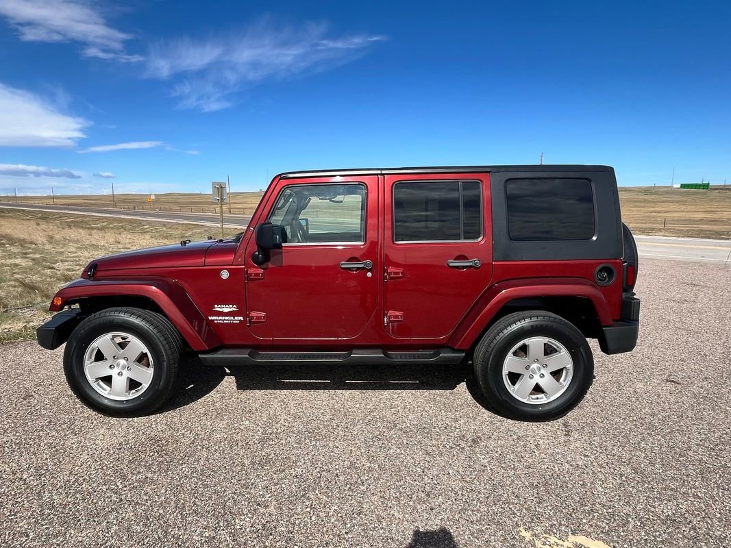 Used 2010 Jeep Wrangler Unlimited Sahara w/ Dual Top Group image 2