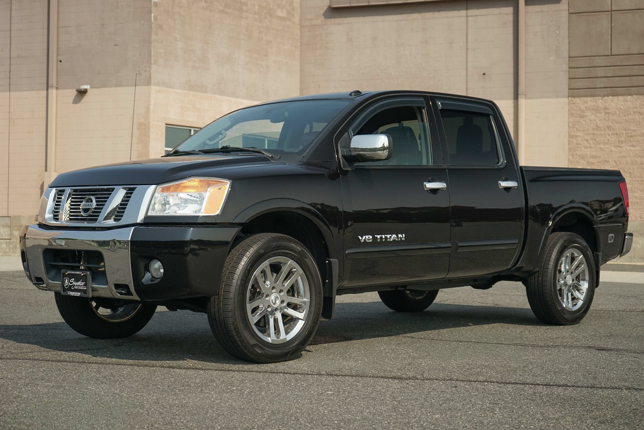 Used 2012 Nissan Titan SL w/ Heavy Metal Edition Pkg AWD/4WD image 2
