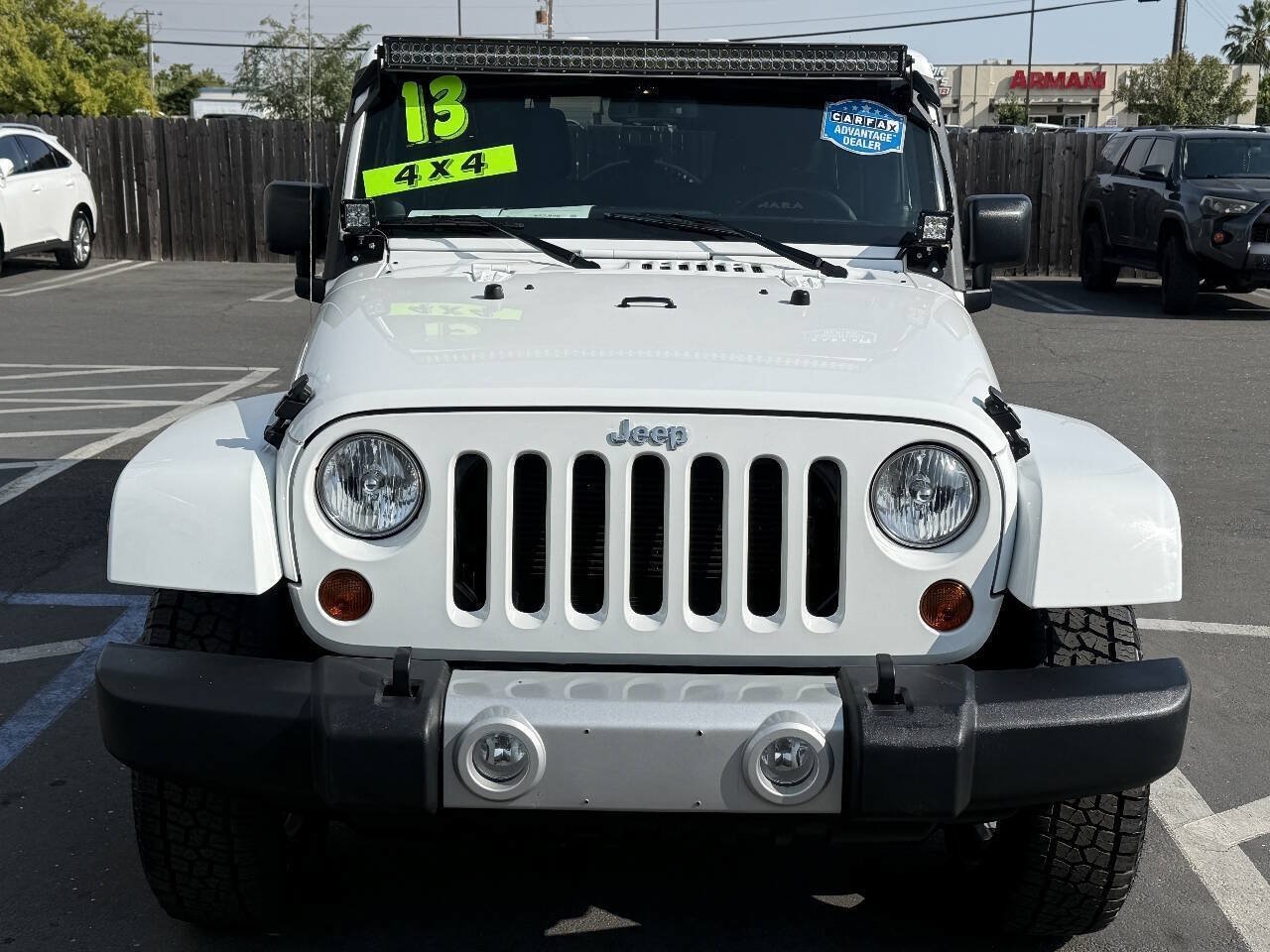 Used 2013 Jeep Wrangler Unlimited Sahara AWD/4WD image 2