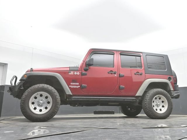 Used 2012 Jeep Wrangler Unlimited Sport w/ Max Tow Pkg AWD/4WD image 29