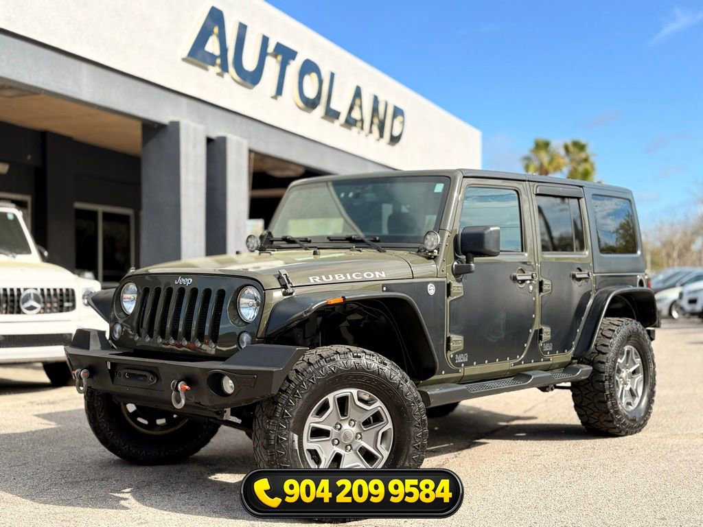 Used 2015 Jeep Wrangler Unlimited Rubicon w/ Dual Top Group AWD/4WD image 1