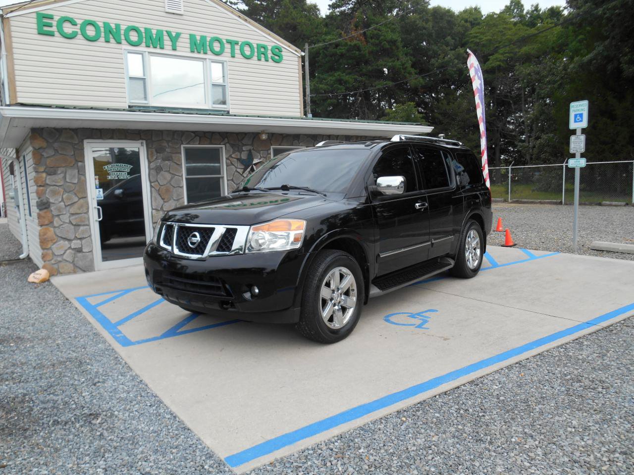 Used 2011 Nissan Armada Platinum w/ 2nd Row Captain Seat Pkg AWD/4WD image 1