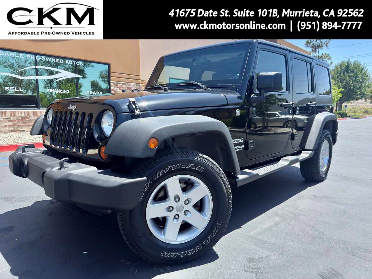 Used 2013 Jeep Wrangler Unlimited Sport image 1