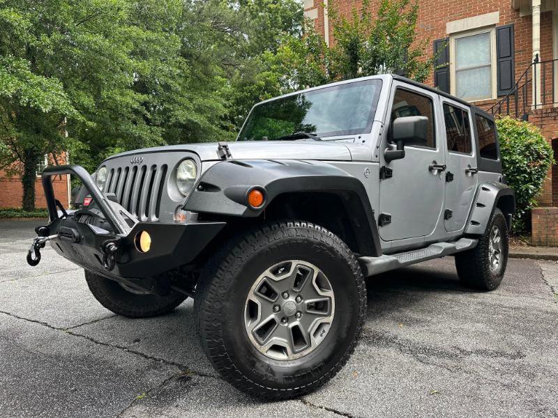 Used 2014 Jeep Wrangler Unlimited Sport