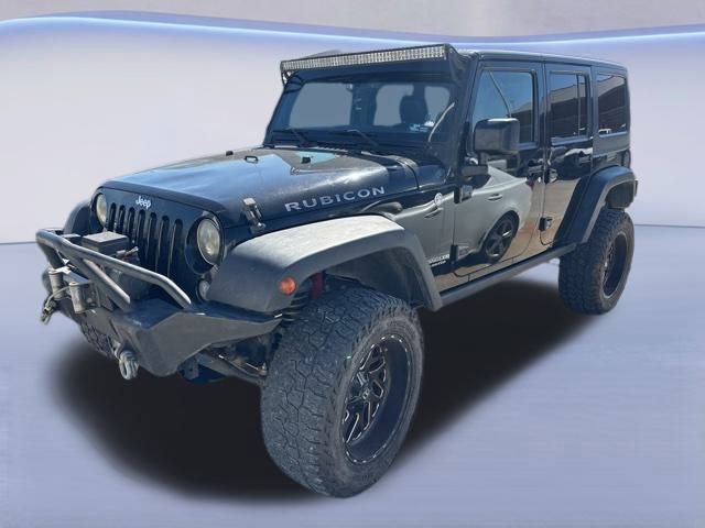 Used 2015 Jeep Wrangler Unlimited Rubicon w/ Dual Top Group AWD/4WD image 1