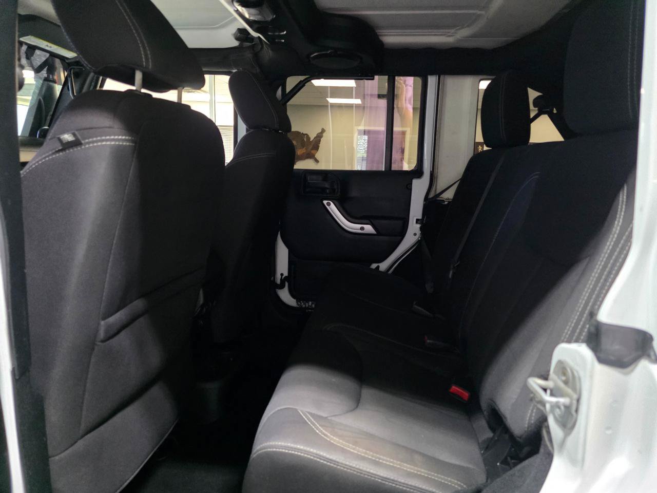 Used 2013 Jeep Wrangler Unlimited Sahara w/ Dual Top Group AWD/4WD image 19