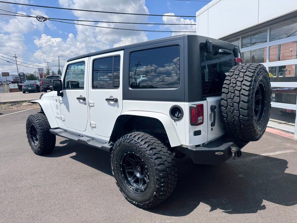 Used 2014 Jeep Wrangler Unlimited Sahara w/ Connectivity Group AWD/4WD image 3