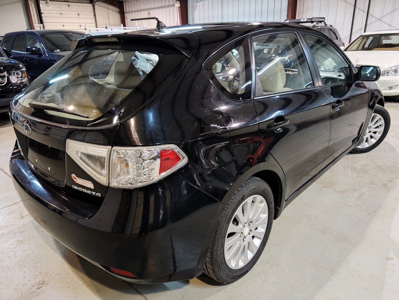 Used 2011 Subaru Impreza 2.5i Premium w/ PWR Moonroof Value Pkg image 8
