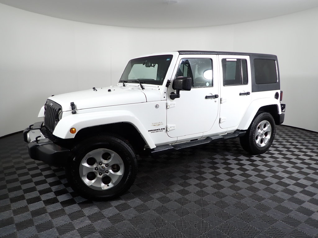 Used 2013 Jeep Wrangler Unlimited Sahara w/ Dual Top Group AWD/4WD image 9