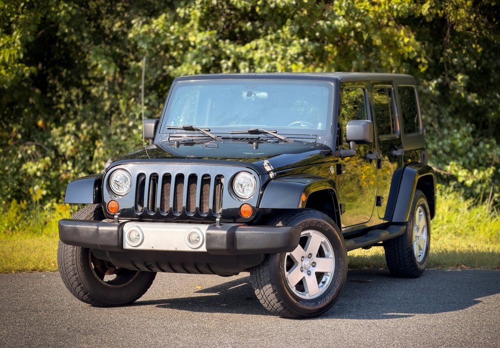 Used 2011 Jeep Wrangler Unlimited Sahara w/ Dual Top Group image 1