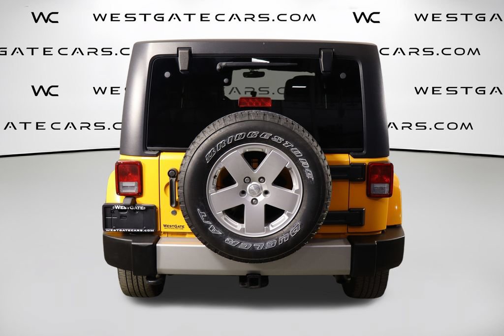 Used 2012 Jeep Wrangler Unlimited Sahara w/ Dual Top Group AWD/4WD image 4