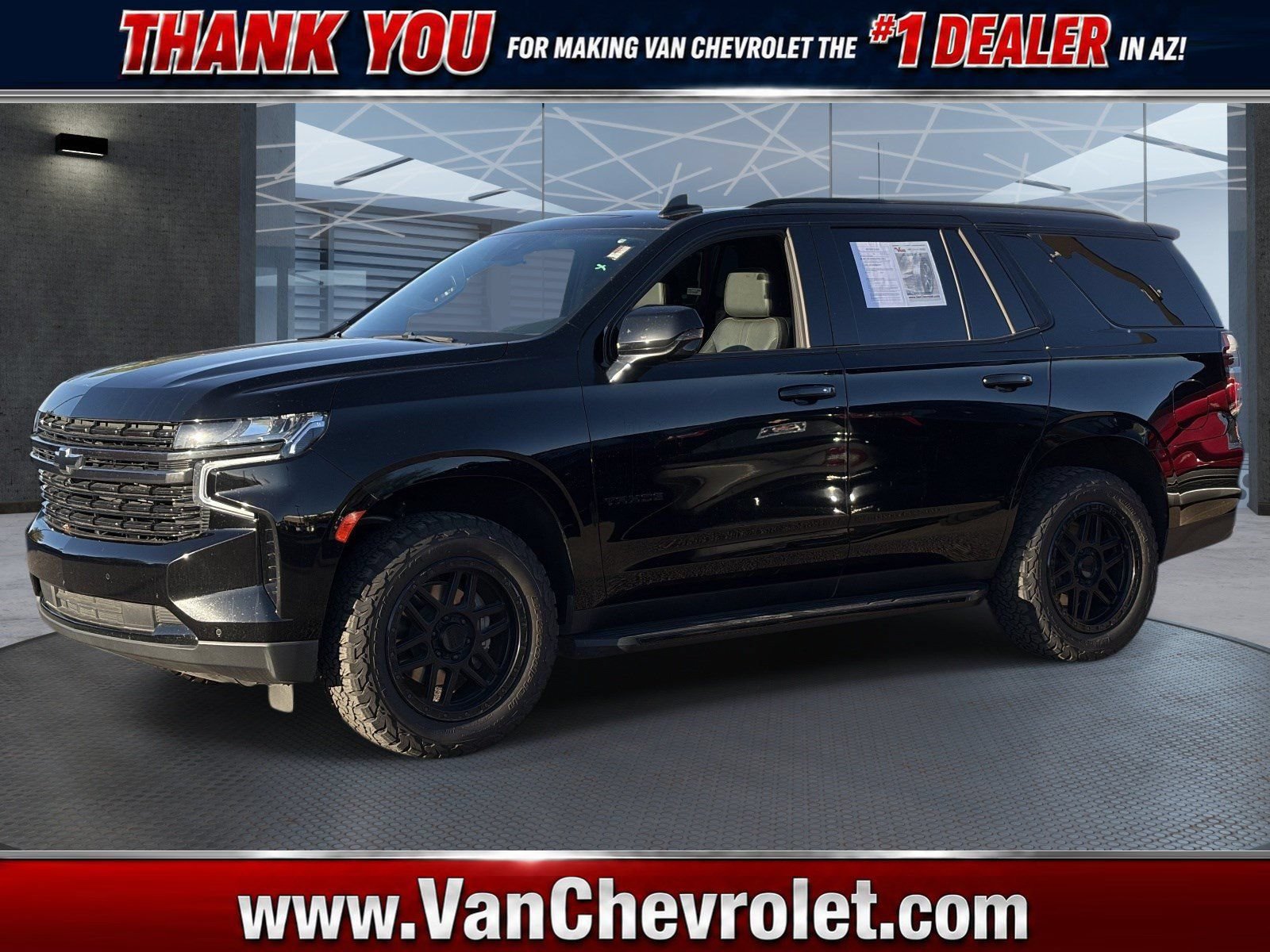 Certified 2022 Chevrolet Tahoe RST w/ Luxury Package AWD/4WD image 1