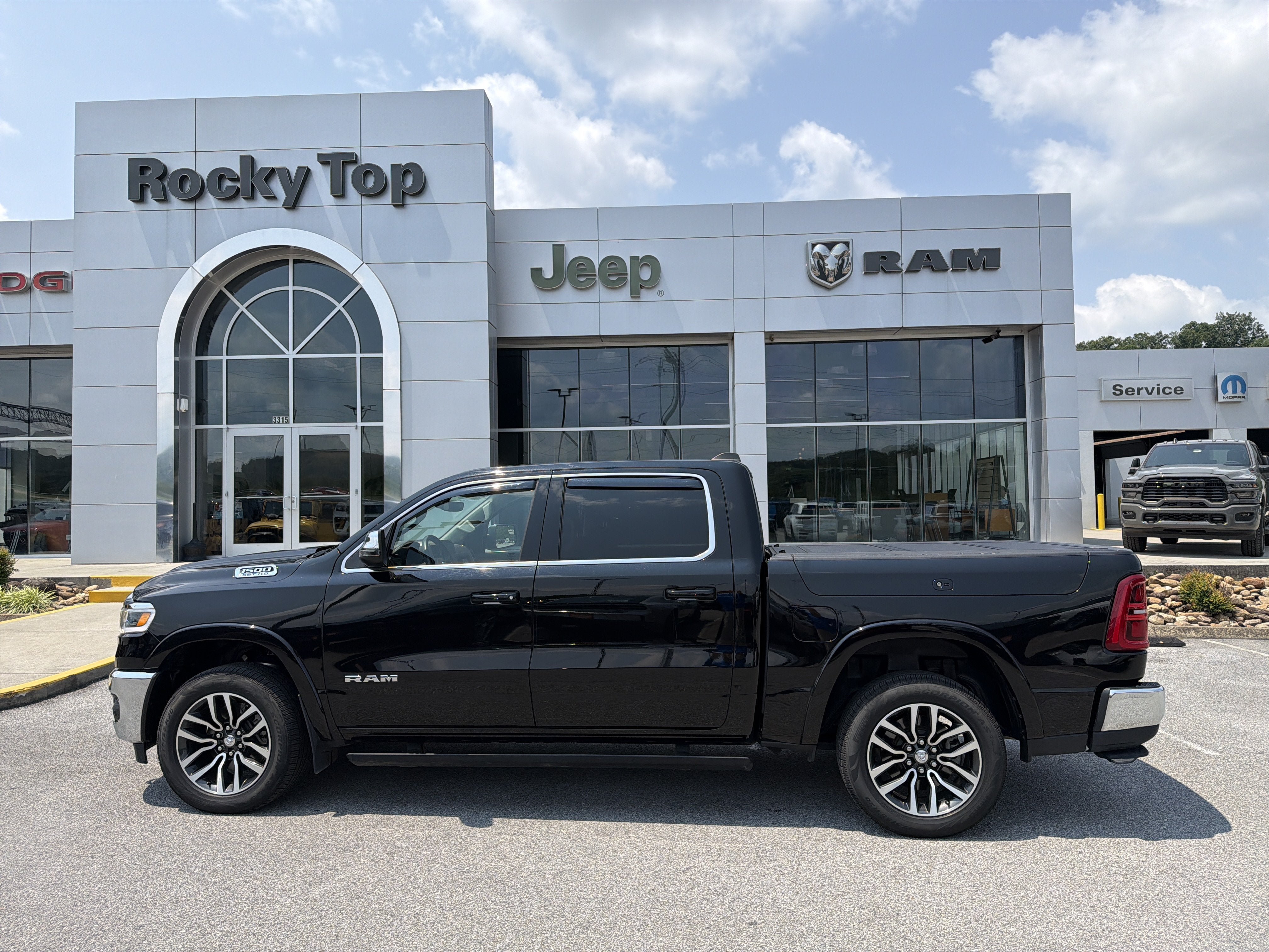 Used 2025 RAM 1500 Limited w/ Bed Utility Group