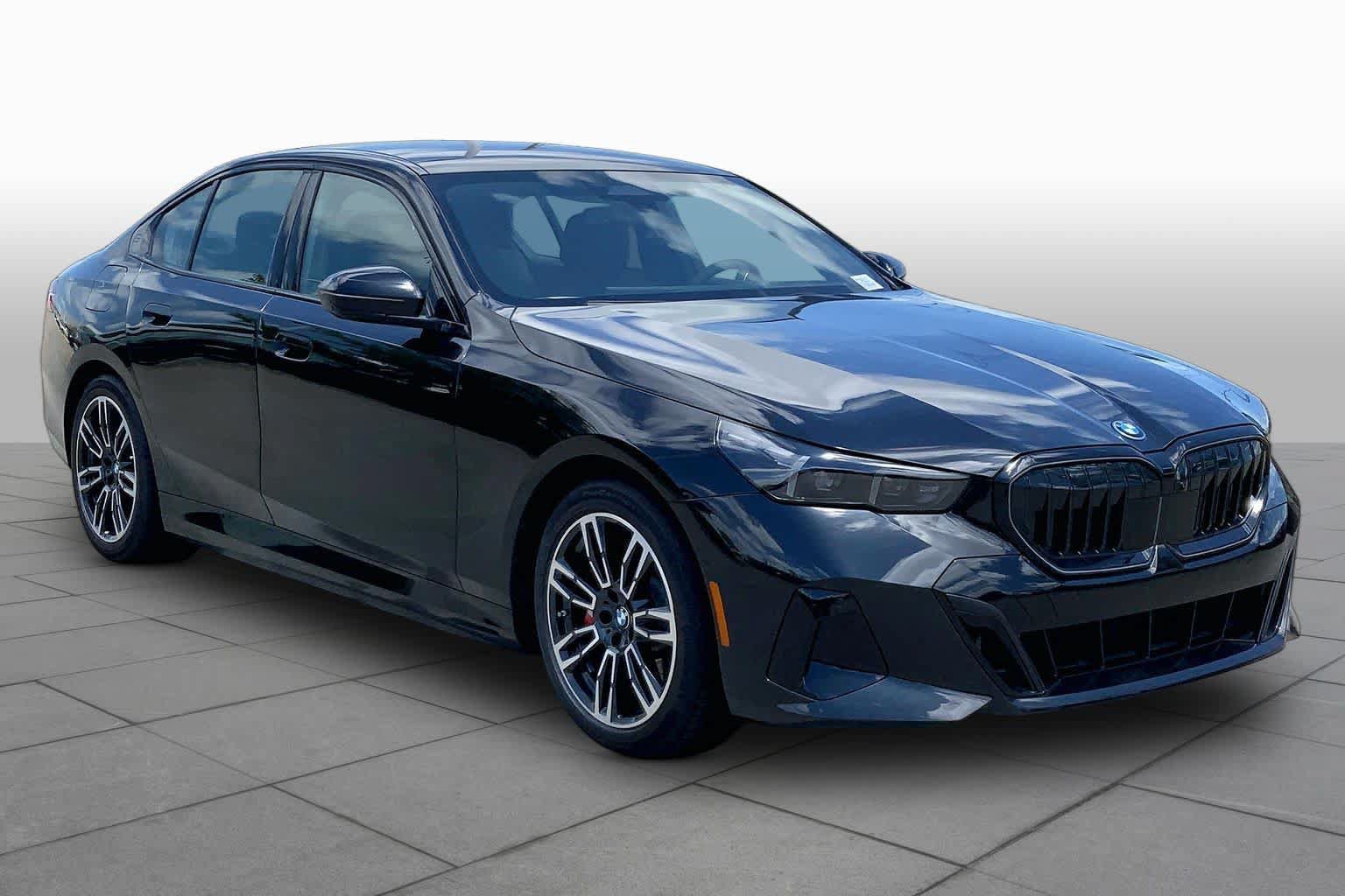 New 2026 BMW 550e xDrive w/ Premium Package AWD/4WD image 2