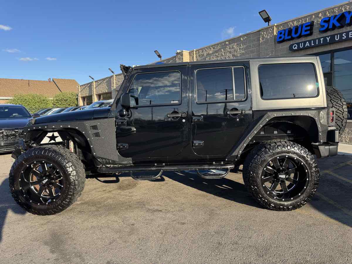 Used 2013 Jeep Wrangler Unlimited Sport AWD/4WD image 9