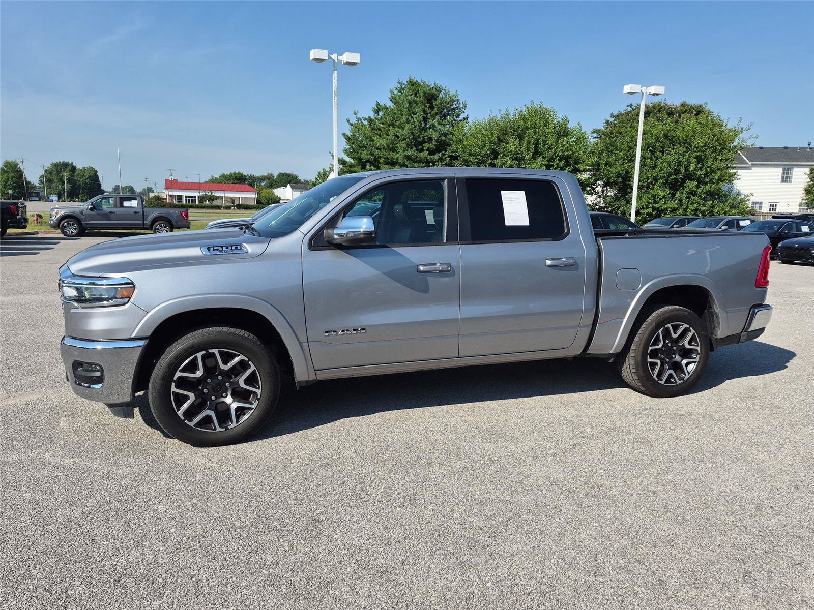 Used 2025 RAM 1500 Laramie AWD/4WD image 2