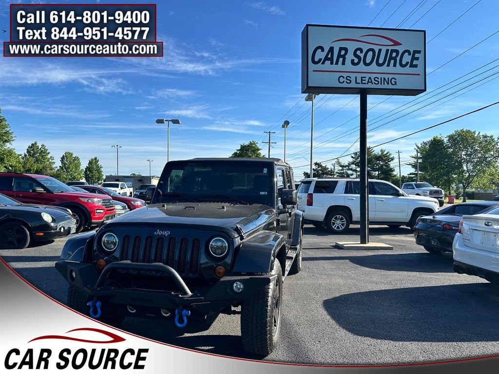 Used 2012 Jeep Wrangler Unlimited Sahara AWD/4WD image 1