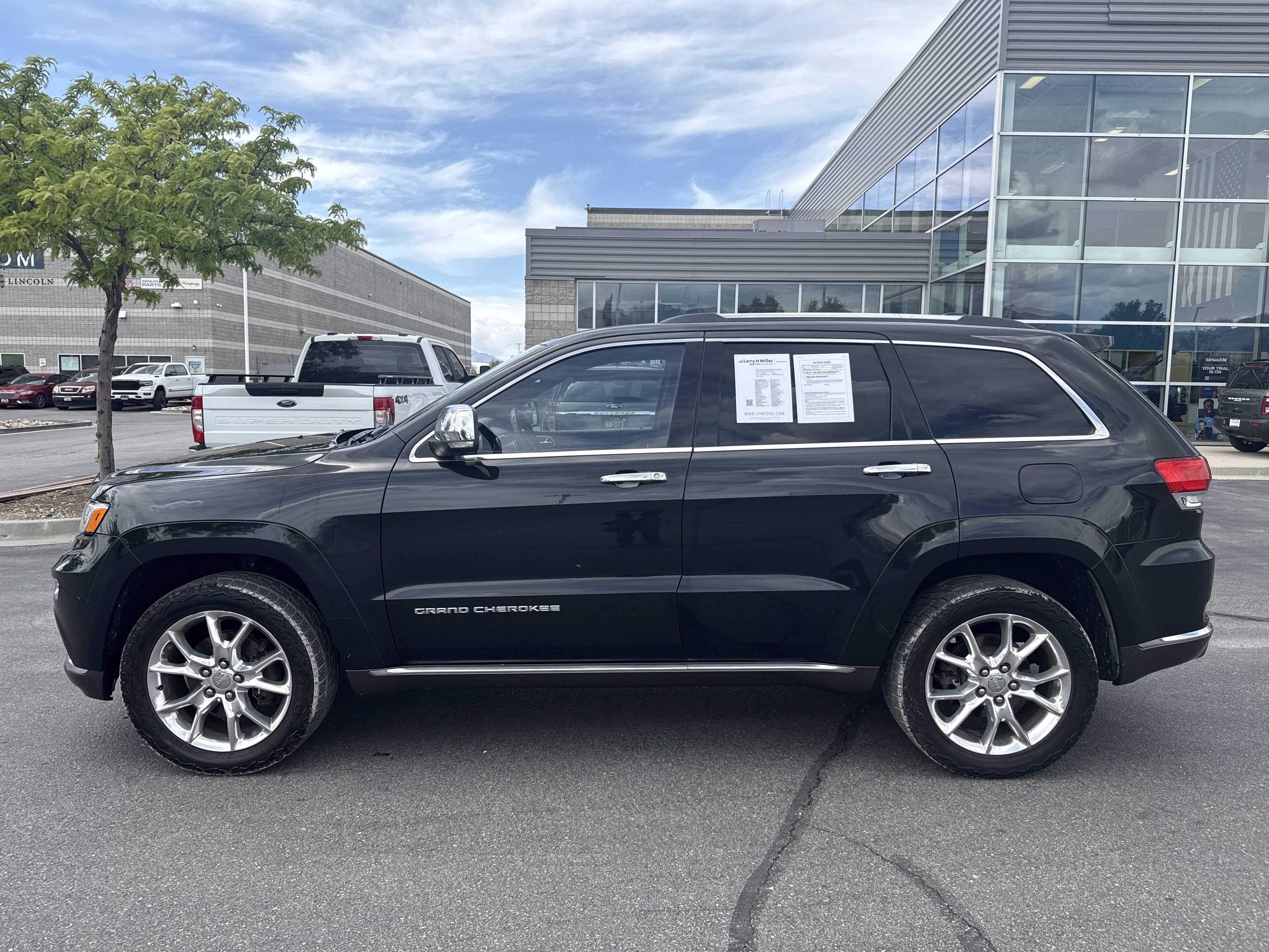 Used 2015 Jeep Grand Cherokee Summit AWD/4WD image 2