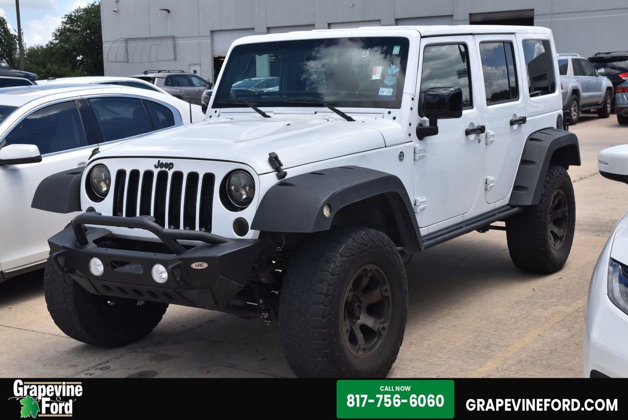 Used 2015 Jeep Wrangler Unlimited Sahara AWD/4WD image 1