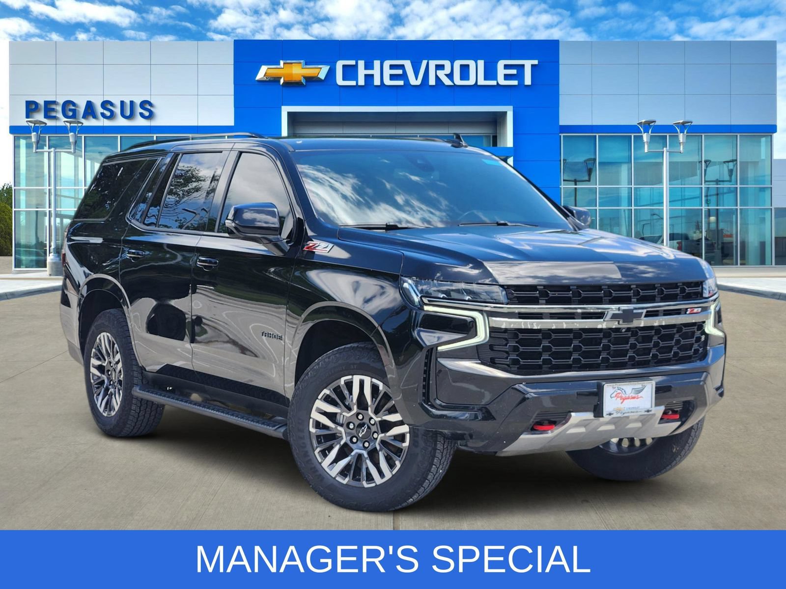 Certified 2021 Chevrolet Tahoe Z71 w/ Luxury Package AWD/4WD image 1