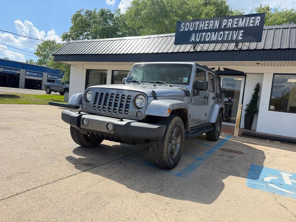 Used 2015 Jeep Wrangler Unlimited Sport image 1
