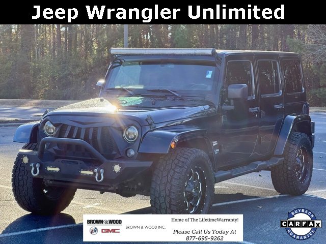 Used 2014 Jeep Wrangler Unlimited Sahara image 1