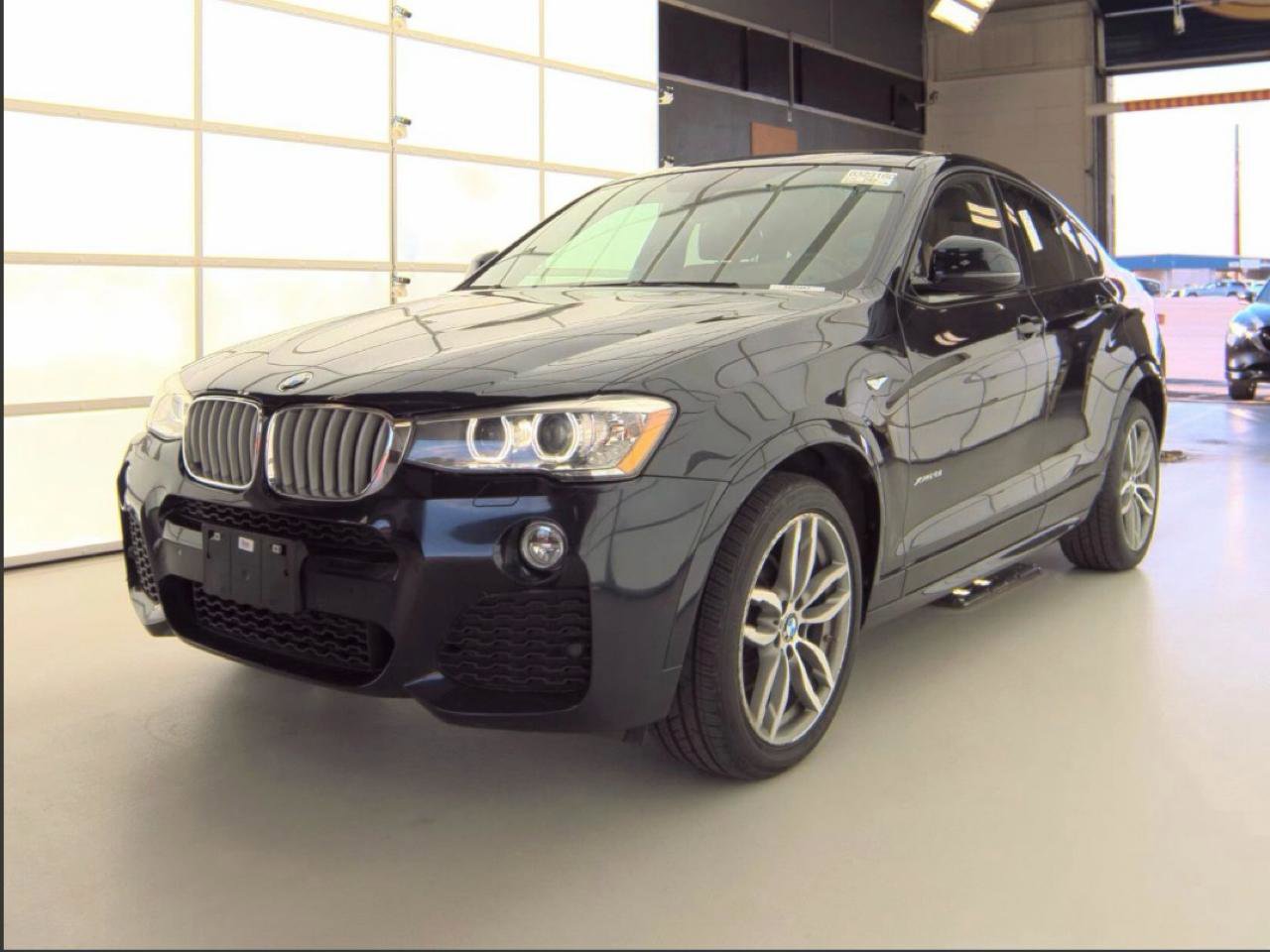Used 2017 BMW X4 xDrive28i w/ Technology Package AWD/4WD image 1